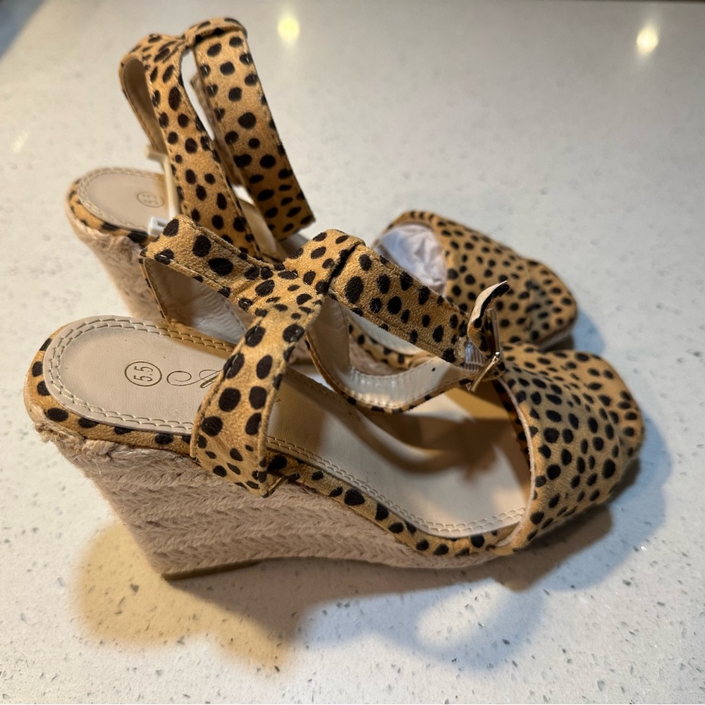 NWOT Women’s 5.5” cheetah wedges, never worn
